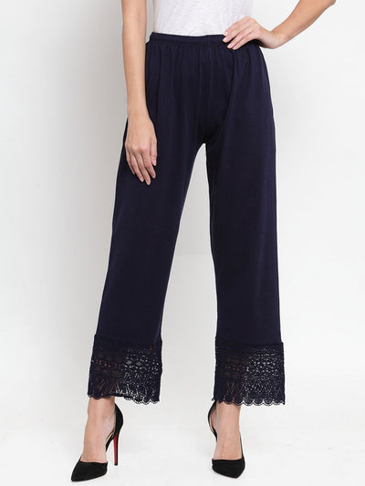 Navy blue viscose lace palazzo with intricate detailing at the hem.