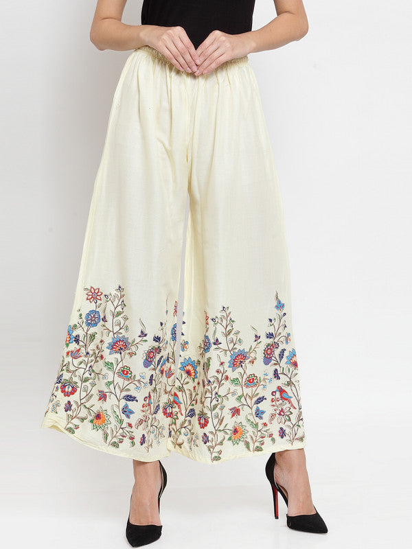 Off-White Floral Printed Rayon Palazzo with botanical design at hem.