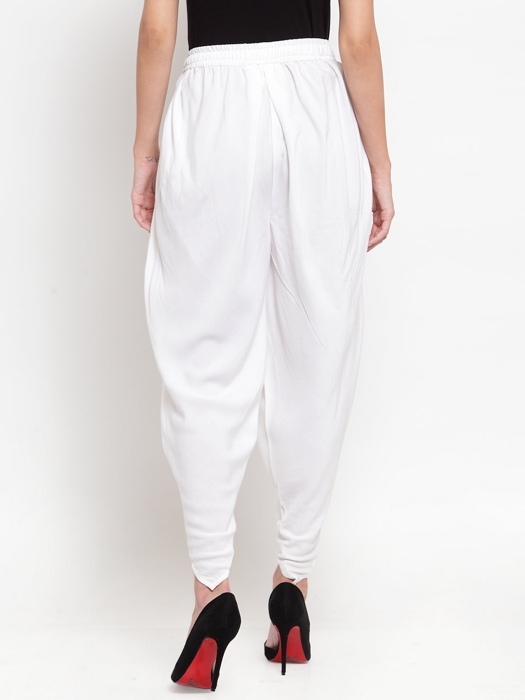 White Rayon Dhoti Salwar with elastic waistband and solid pattern.