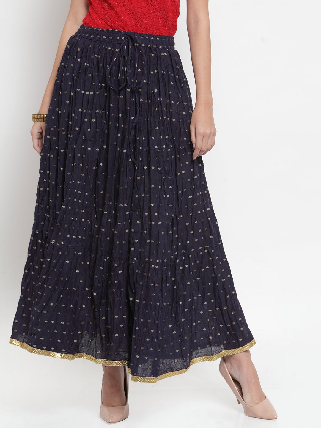 Navy blue bandhani maxi skirt with zari pattern and flared design.