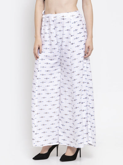 White flared rayon sharara with printed pattern and elasticated waistband.