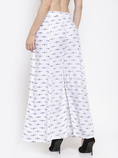 White flared rayon sharara with printed pattern and elasticated waistband.