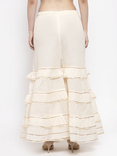 Off-white frill Gotta Patti cotton gharara with elastic waistband and drawstring.