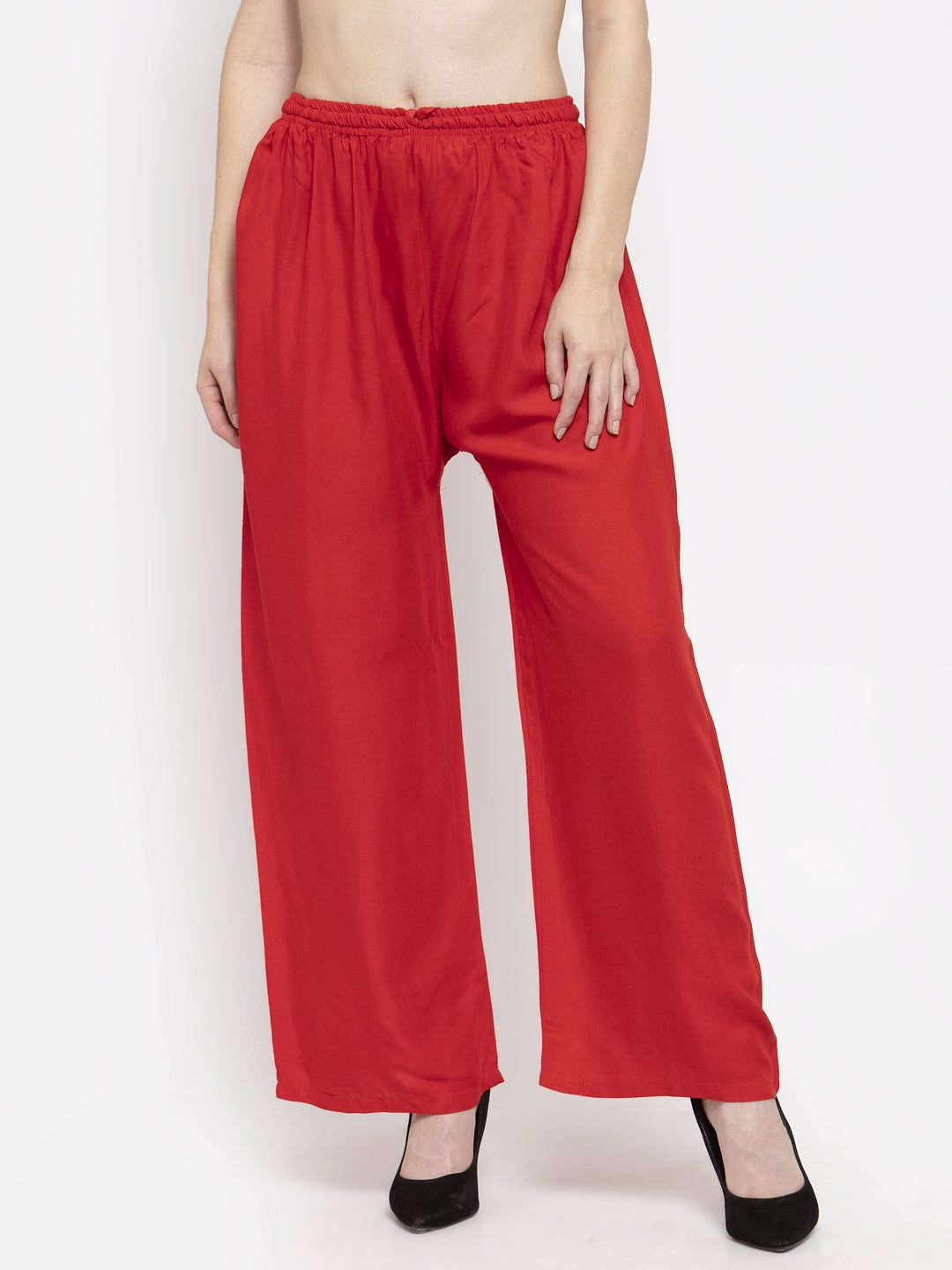 Red solid rayon palazzo with elasticated waistband for comfortable fit.