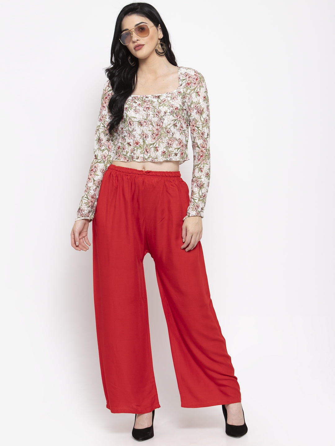 Red solid rayon palazzo with elasticated waistband for comfortable fit.