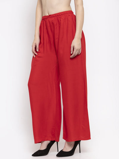 Red solid rayon palazzo with elasticated waistband for a comfortable fit.