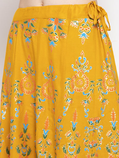 Mustard printed flared rayon maxi skirt with vibrant floral design.