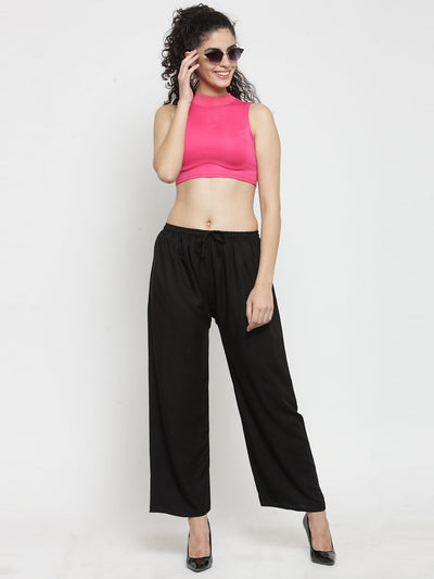 Solid black and white rayon palazzo pants pack of 2 displayed on a model.