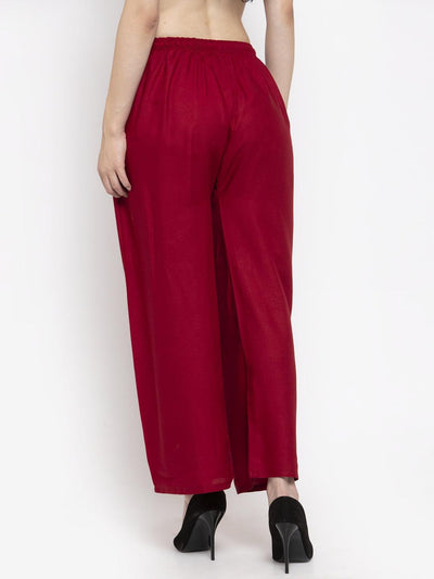 Solid black and maroon rayon palazzo pants with elasticated waistband and drawstring.