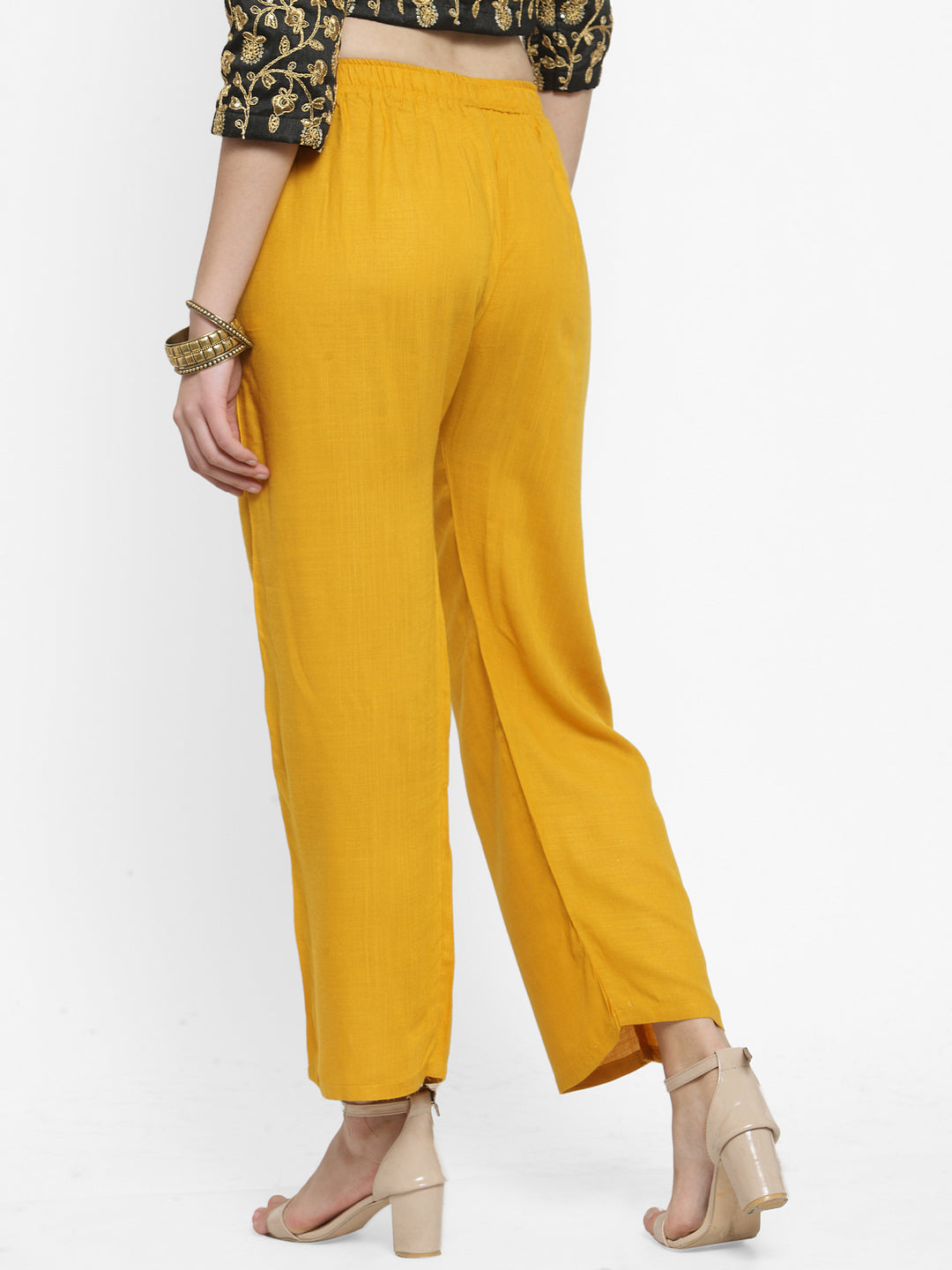 Solid mustard yellow rayon palazzo pants, part of a fashionable pack of two.