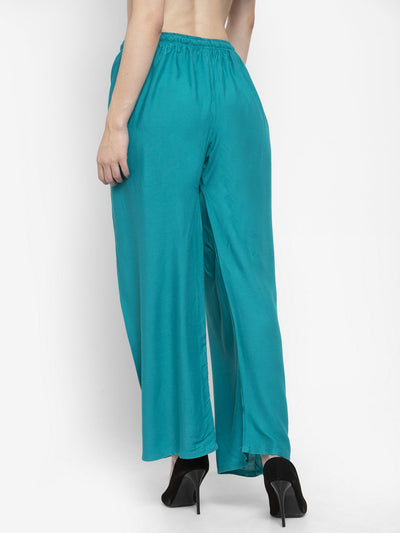 Solid white and turquoise rayon palazzo pants pack of two by Clora Creation.