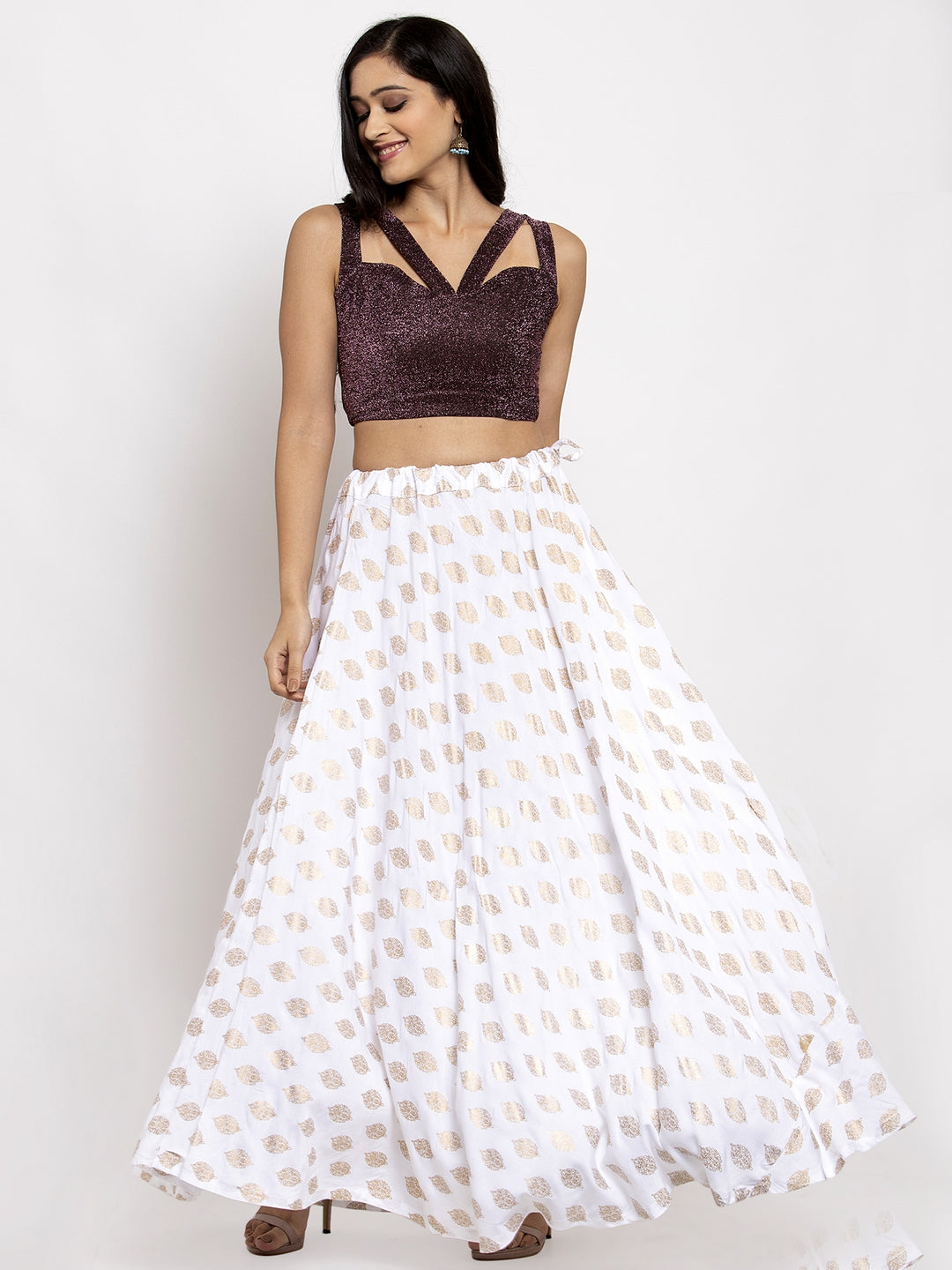 White printed rayon skirt with elasticated waistband and drawstring.