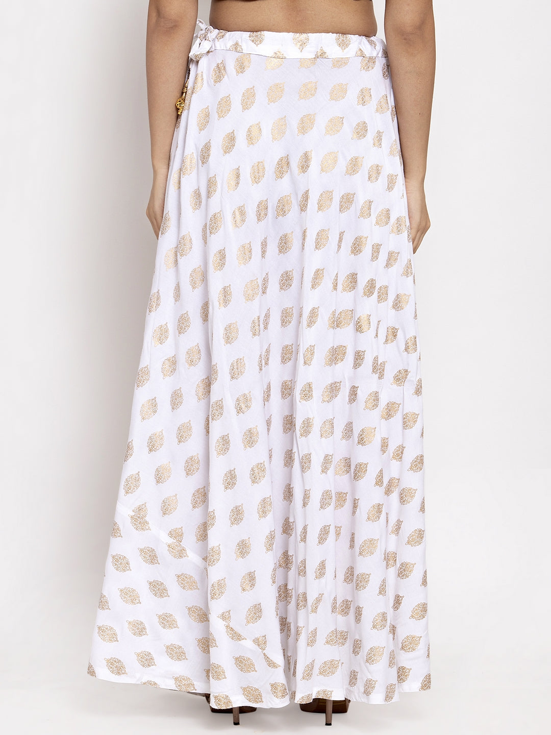 White printed rayon skirt with elastic waistband and drawstring.