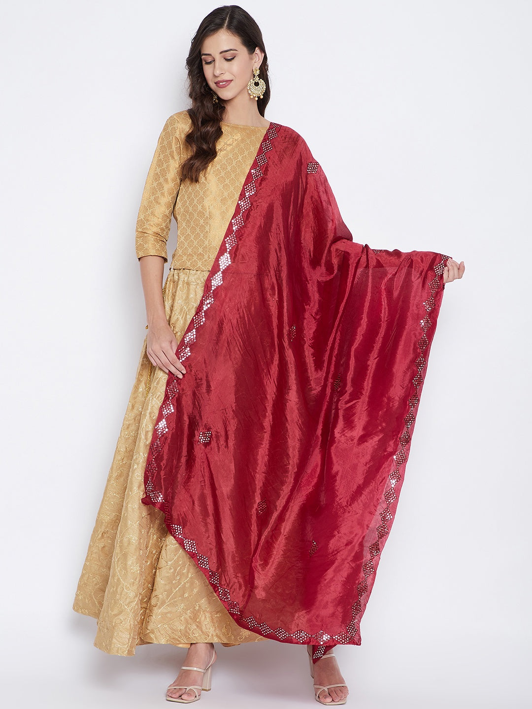 Maroon Mirror Work Silk Dupatta with elegant ethnic design displayed over beige dress.