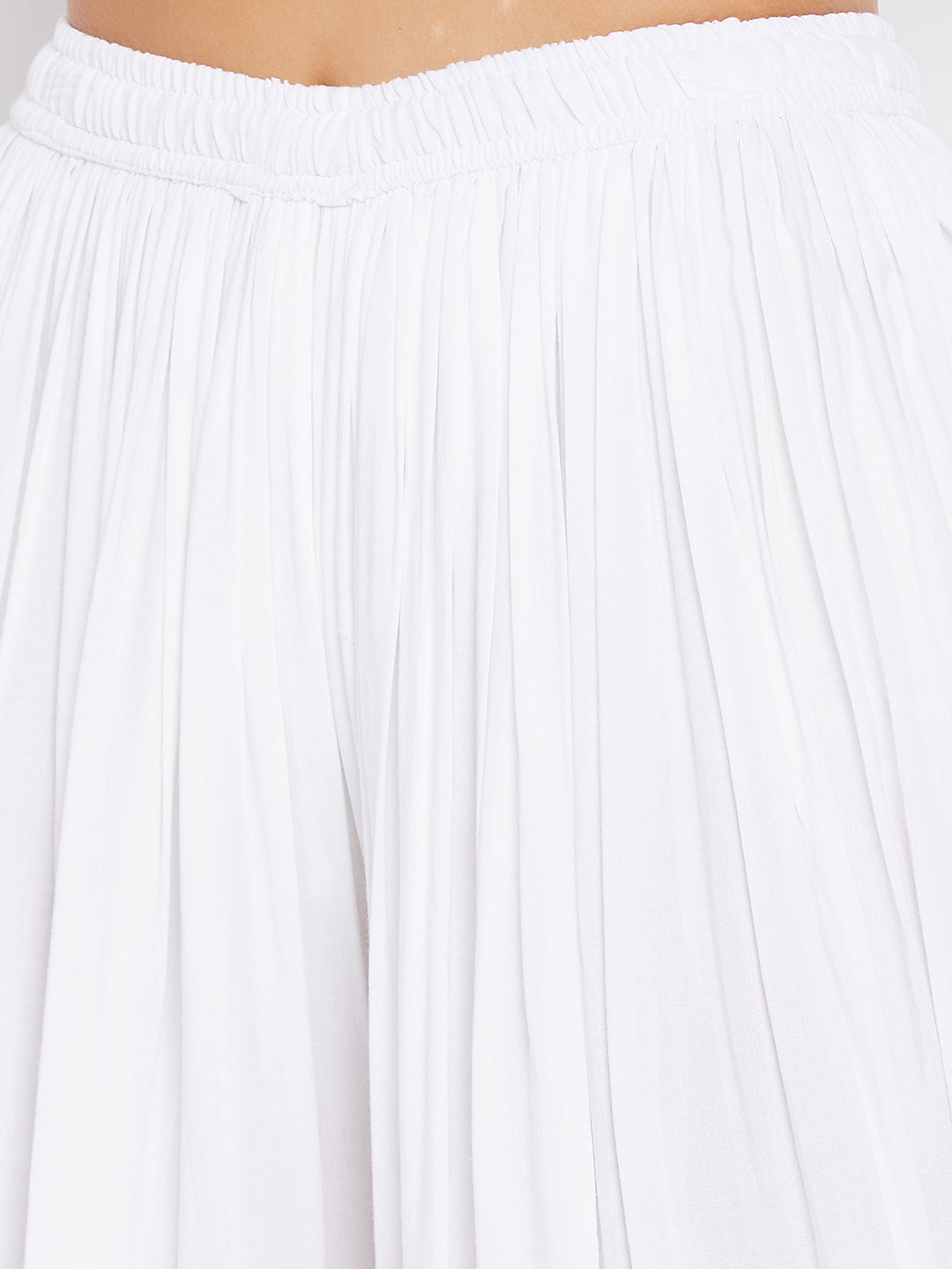 White Rayon Dhoti Salwar with elasticated waistband and solid pattern.