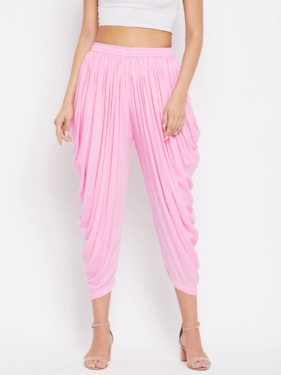 Pink Rayon Dhoti Salwar with elasticated waistband and solid pattern.