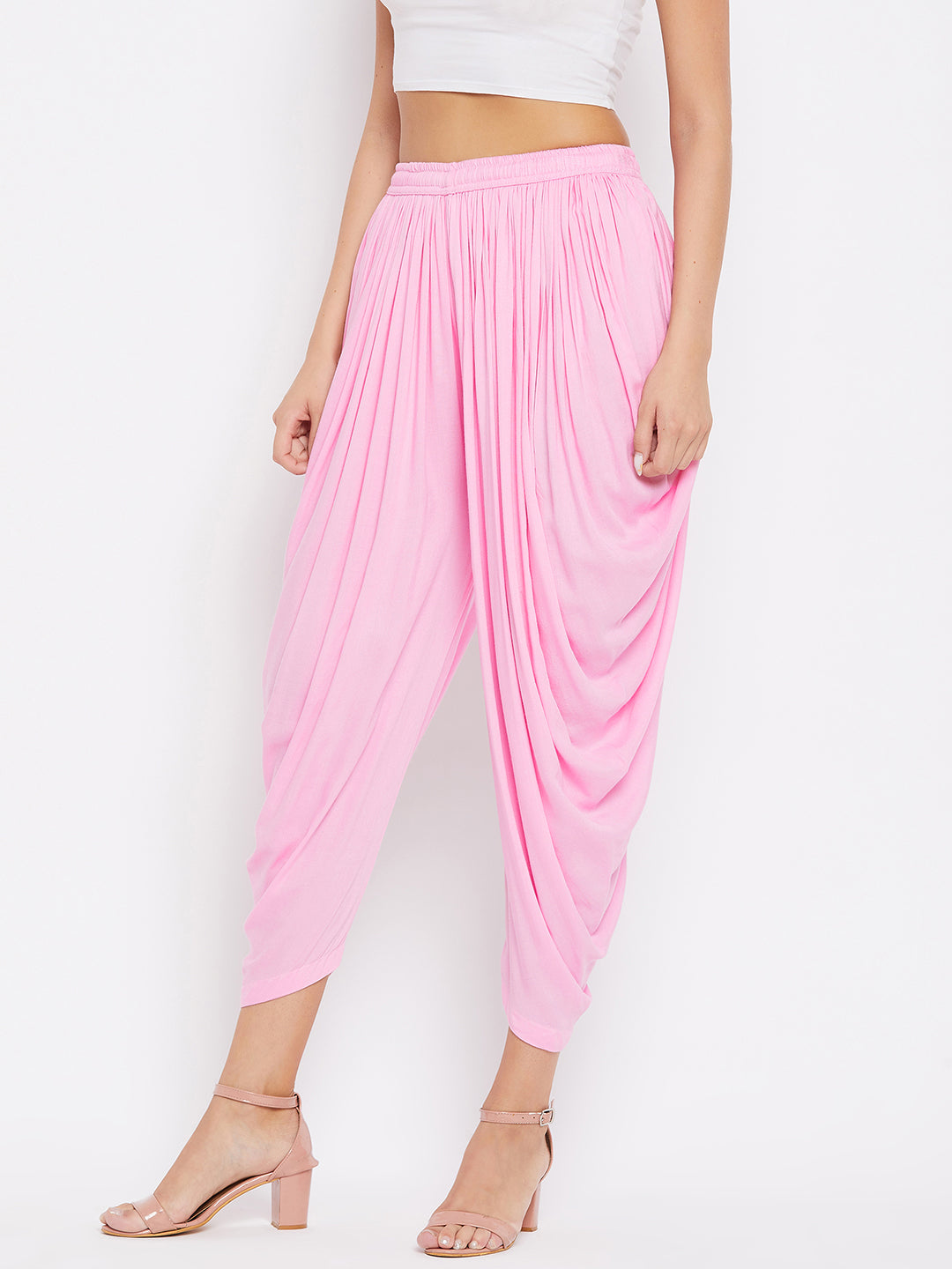 Pink Rayon Dhoti Salwar with elastic waistband and solid pattern.