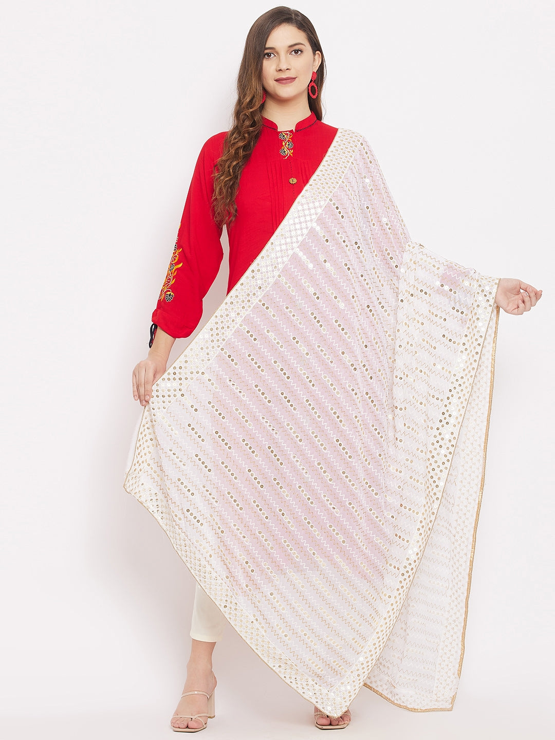 White dyeable embellished georgette dupatta styled with ethnic outfit.