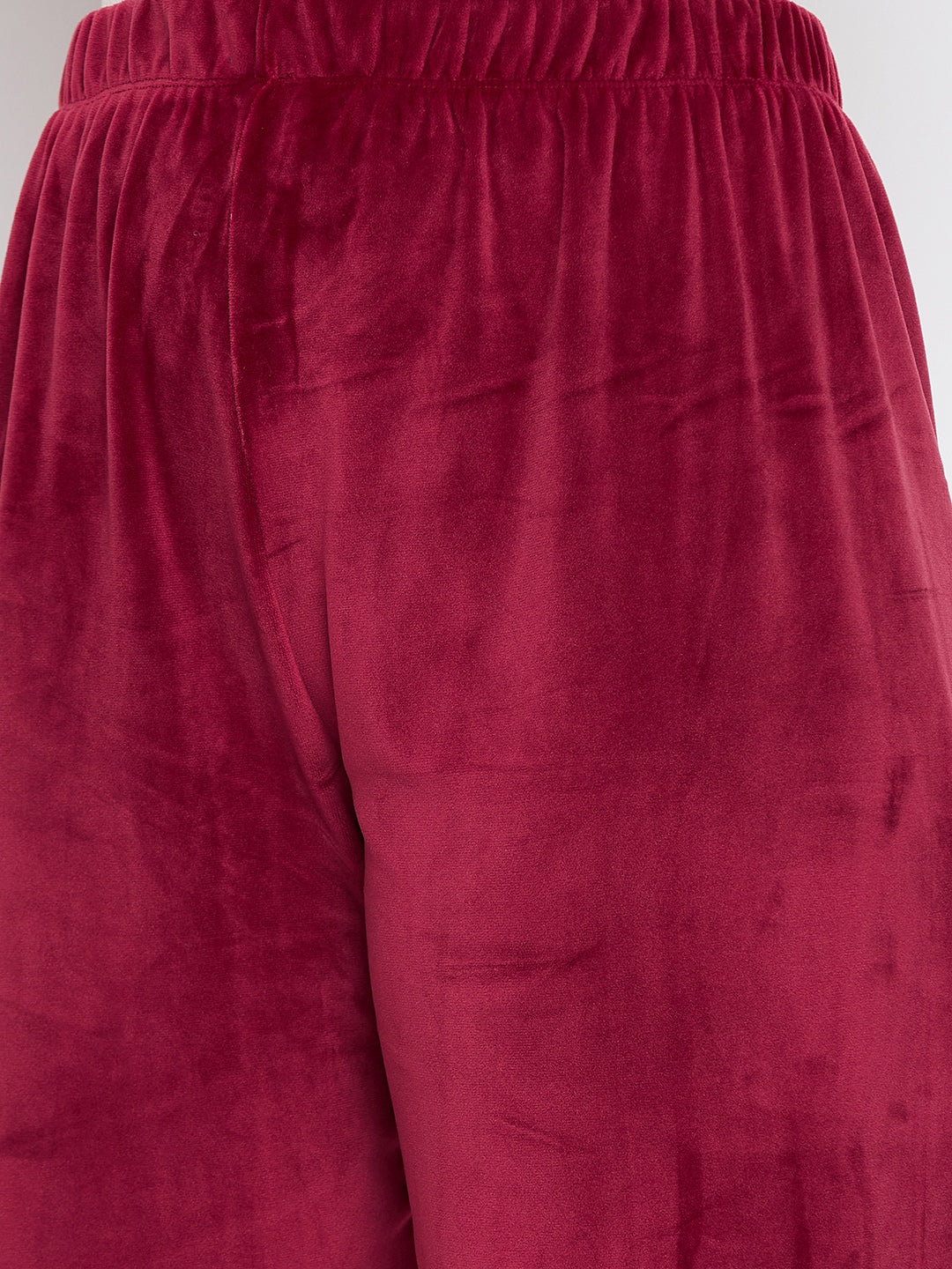 Maroon Solid Velvet Palazzo with rich texture and elastic waistband.