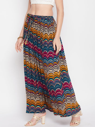 Multicoloured printed rayon skirt with geometric foil design, elasticated waistband, drawstring closure, and flared hem featuring gotta work detailing.