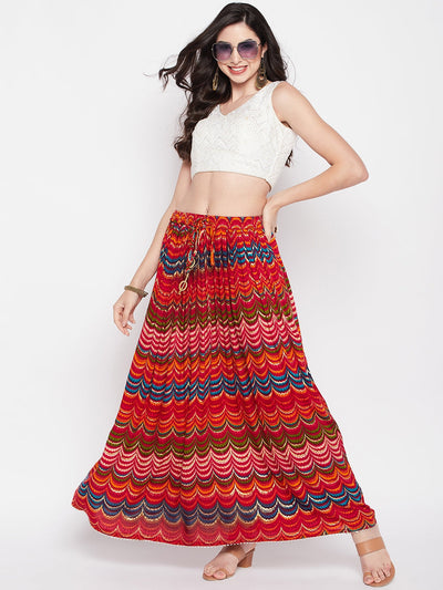 Multicoloured printed rayon skirt with geometric foil print and flared hem.