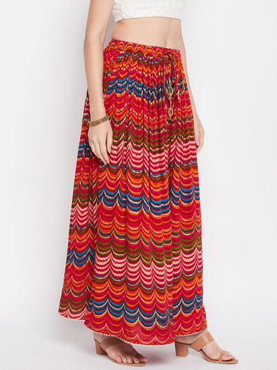 Multicoloured printed rayon skirt with geometric foil design and elastic waistband.