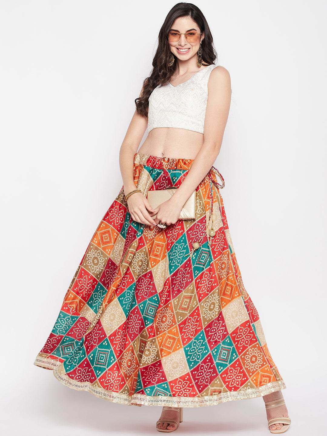 Multicoloured Tie & Dye Bandhani Printed Chinon Skirt with gotta work detailing and drawstring closure.