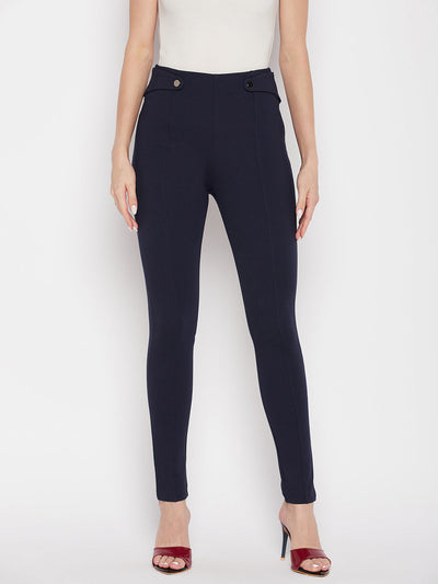 Navy blue solid relaxed fit jeggings with elasticated waistband and two back pockets.