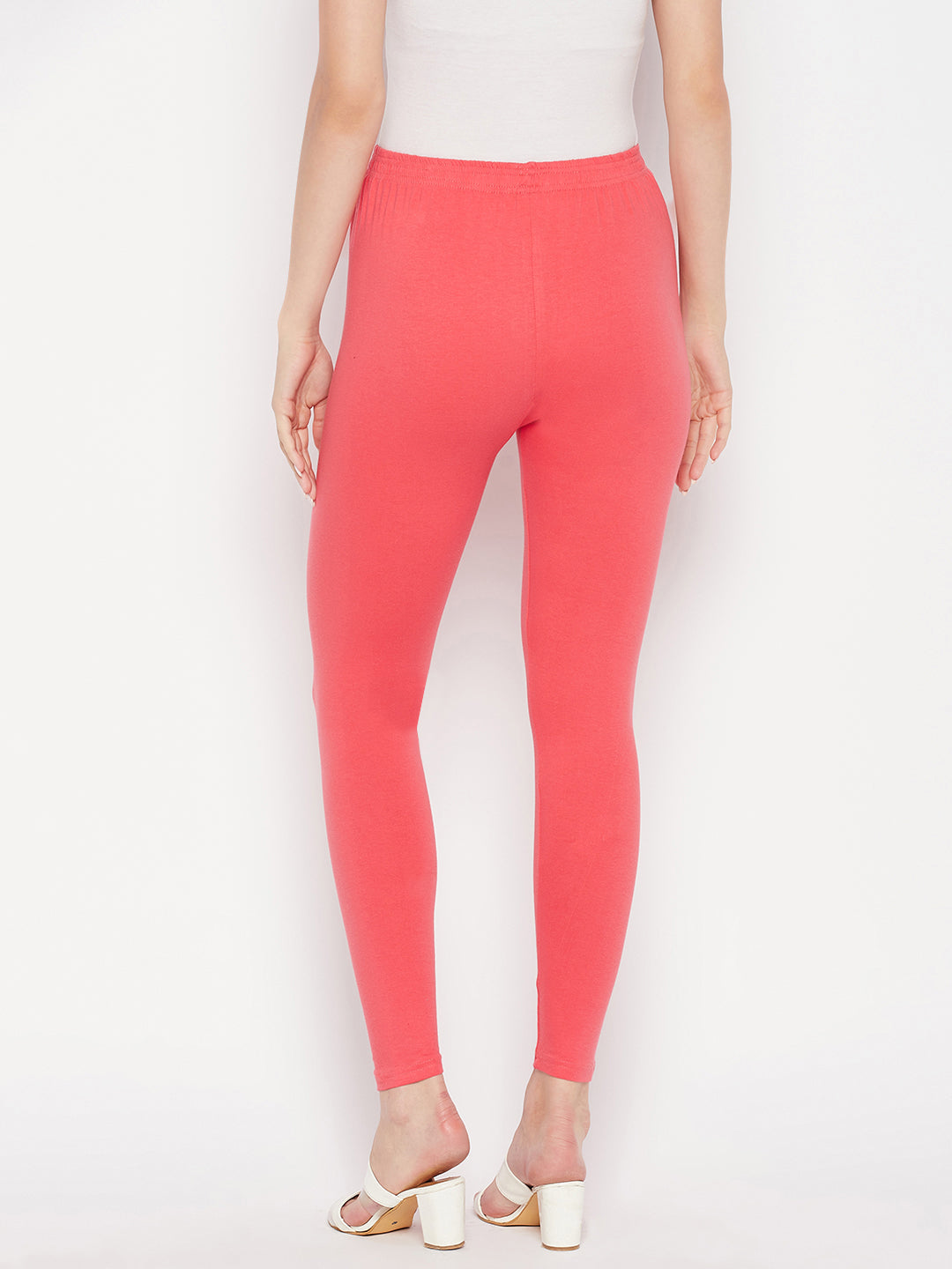 Pink solid ankle length leggings with elasticated waistband.