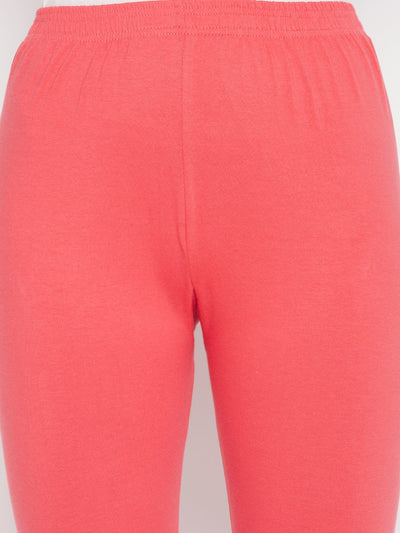 Pink solid ankle length leggings with elasticated waistband.