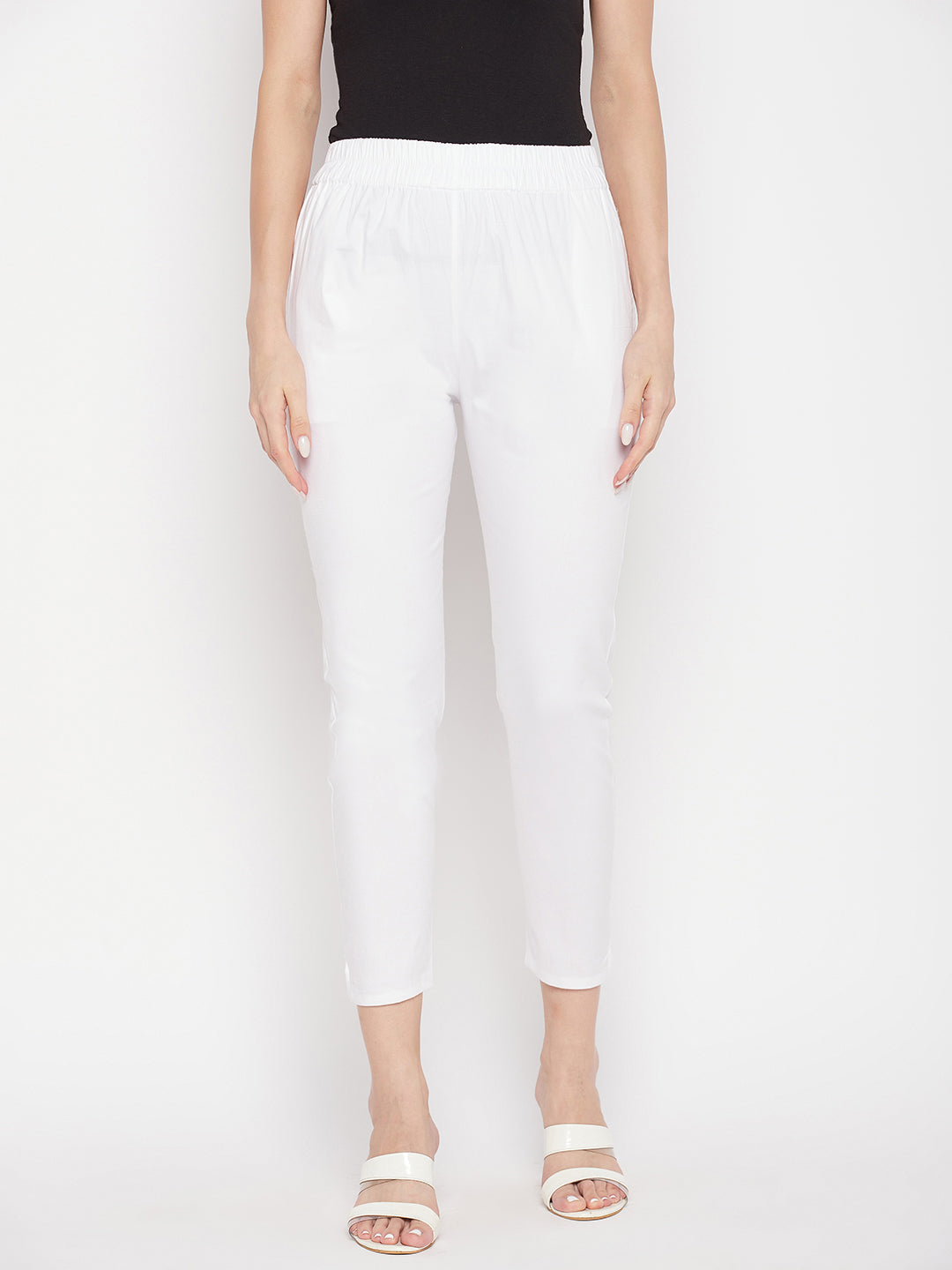 White solid cotton Lycra ankle-length pant with elastic waistband.