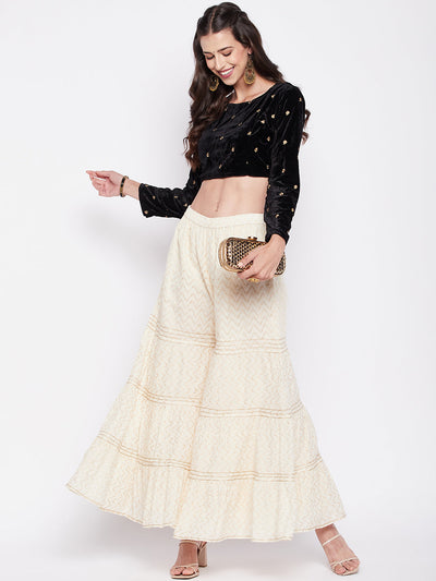 Off-White self-design cotton flared gharara with elasticated waistband.