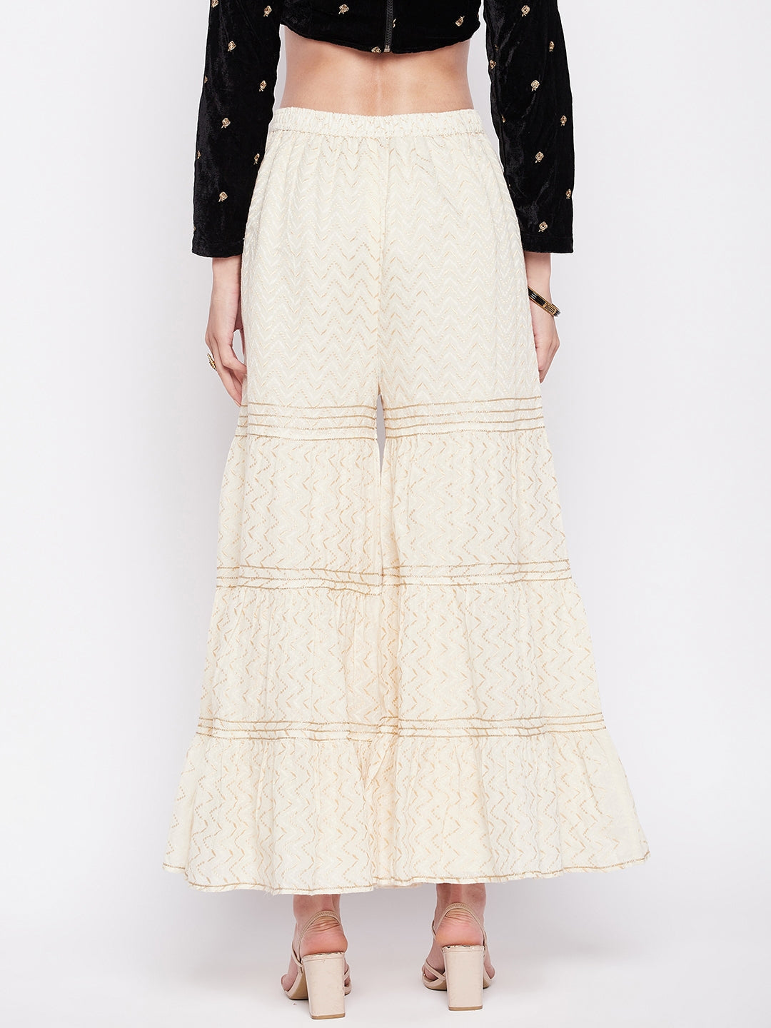 Off-white self-design cotton flared gharara with elasticated waistband.