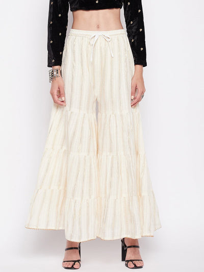 Off-white golden lurex cotton gharara with flared hem and elasticated waistband.