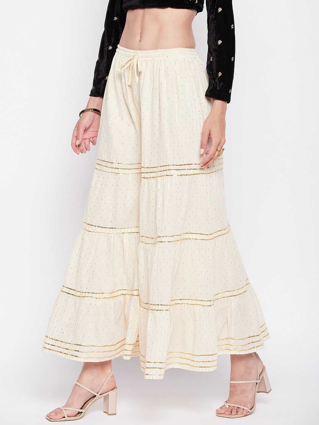 Off-White Golden Lurex Embellished Cotton Gharara with drawstring waistband and flared hem.