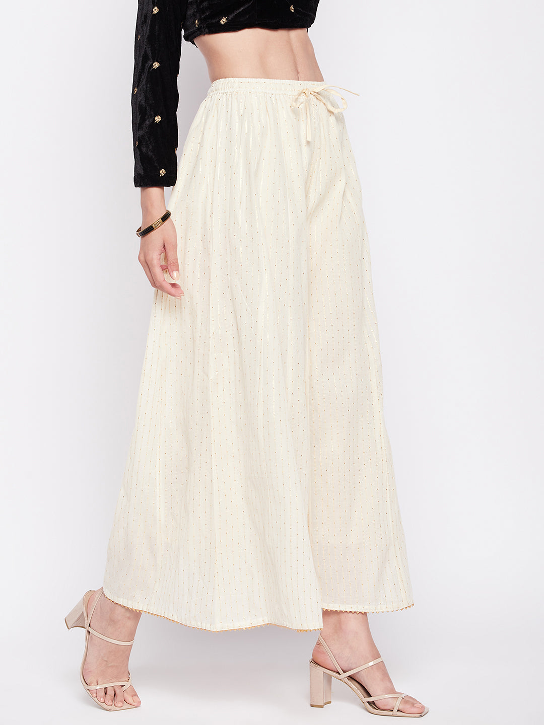 Off-White Golden Lurex Cotton Sharara with elastic waistband and flared hem.