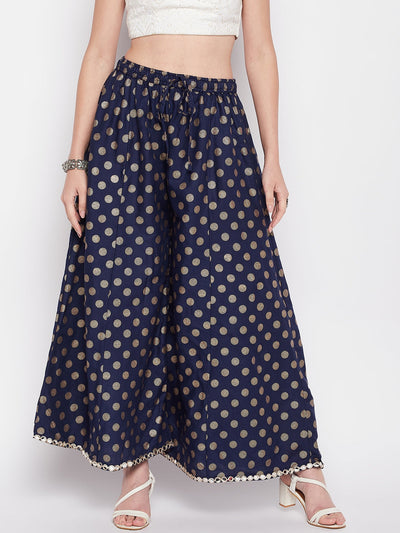 Navy blue polka dot rayon sharara with embellished hem and elasticated waistband.