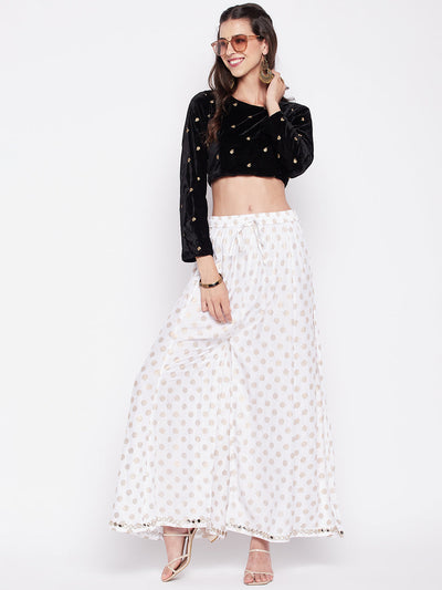 White polka dot rayon sharara with embellished hem and elasticated waistband.