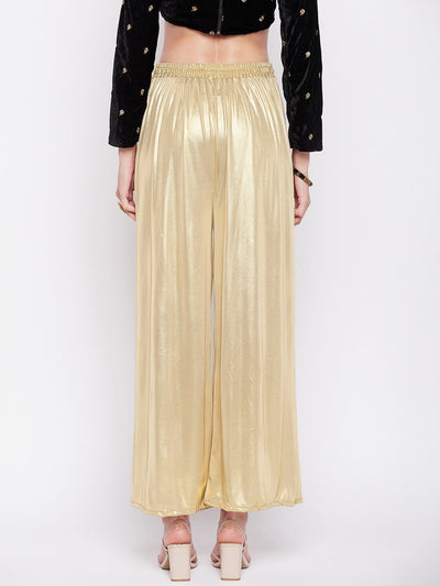 Golden solid shimmer palazzo with flared hem and elasticated waistband.