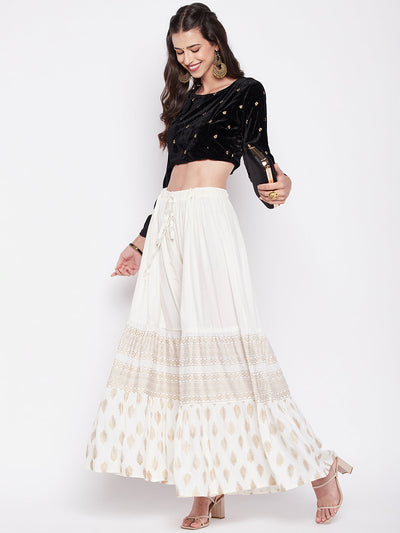 Off-White printed rayon flared gharara with elasticated waistband and drawstring.