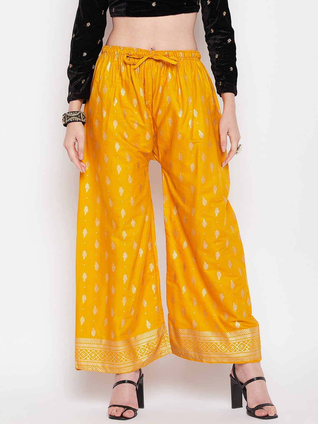 Mustard printed straight palazzo with elasticated waistband and drawstring.