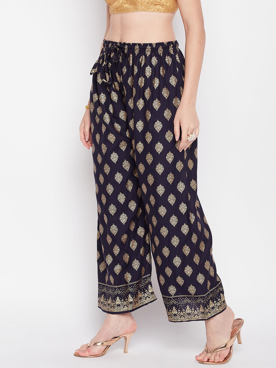 Navy blue printed rayon straight palazzo with elasticated waistband and drawstring.