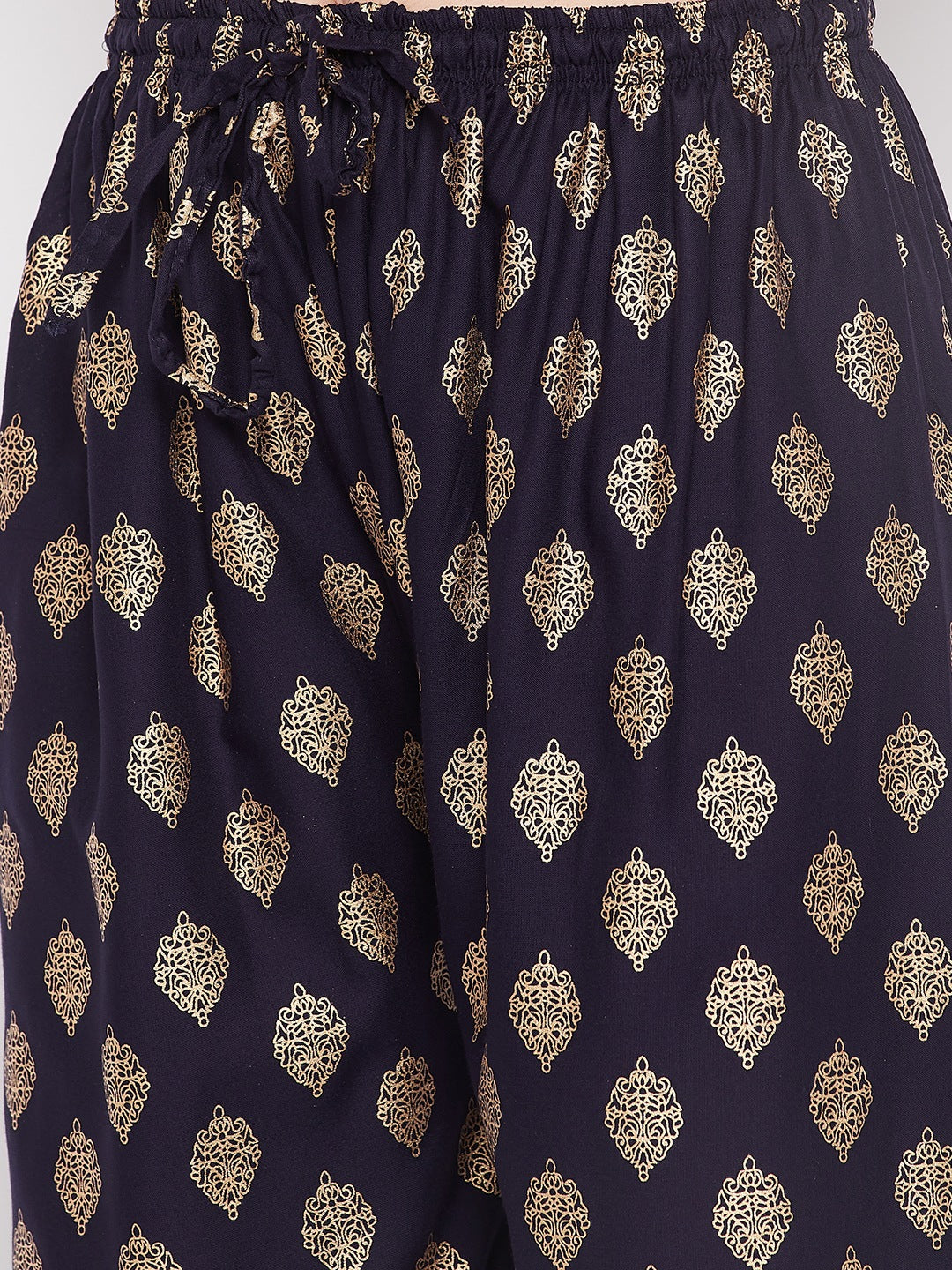 Navy blue printed rayon straight palazzo with elasticated waistband and drawstring.