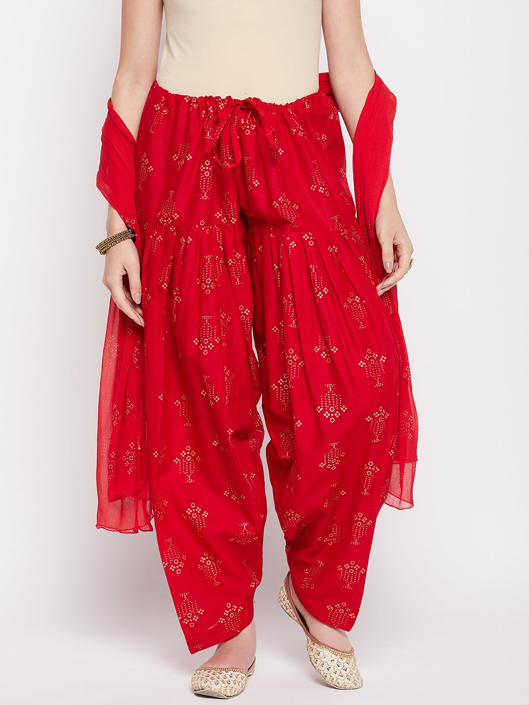 Red printed cotton salwar with matching chiffon dupatta and drawstring waistband.