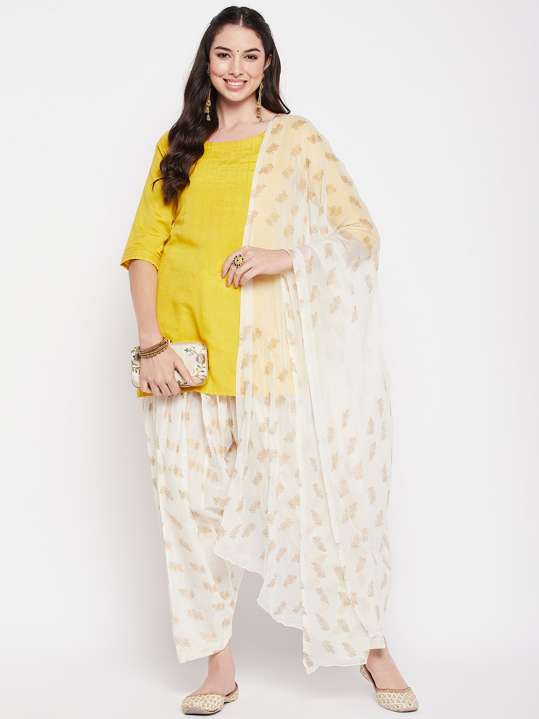 Off-White printed cotton salwar and dupatta with chiffon fabric and drawstring waistband.