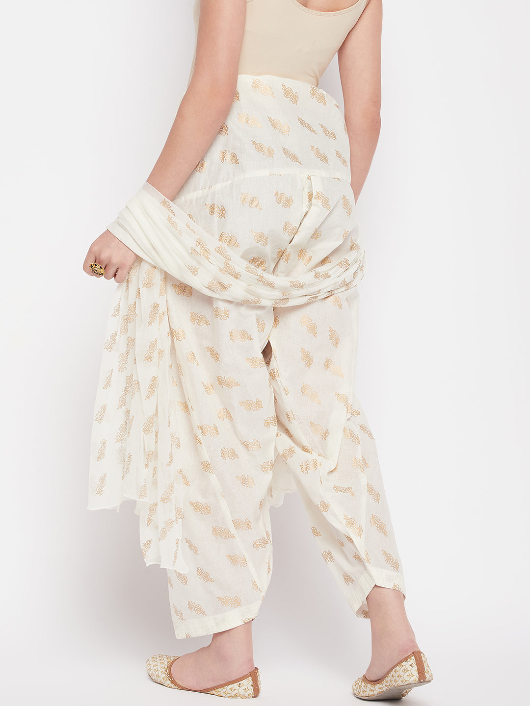 Off-White printed cotton salwar with chiffon dupatta and drawstring waistband.