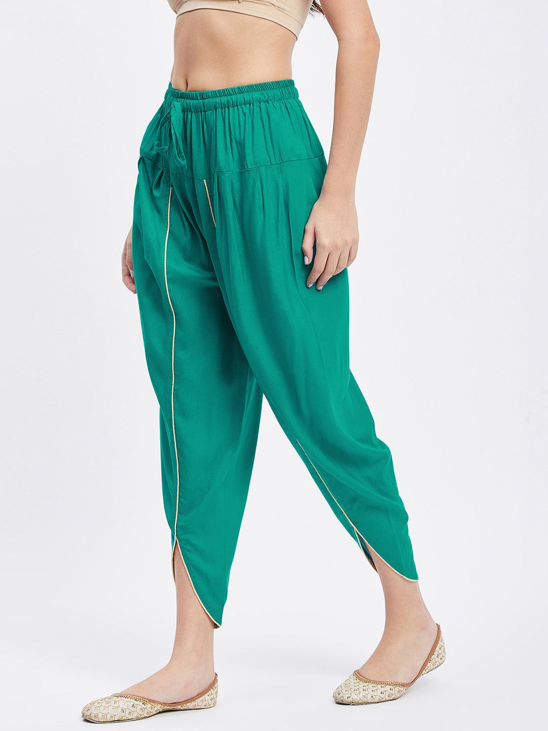 Rama Green Solid Rayon Tulip Pant with elastic waistband and side pocket.