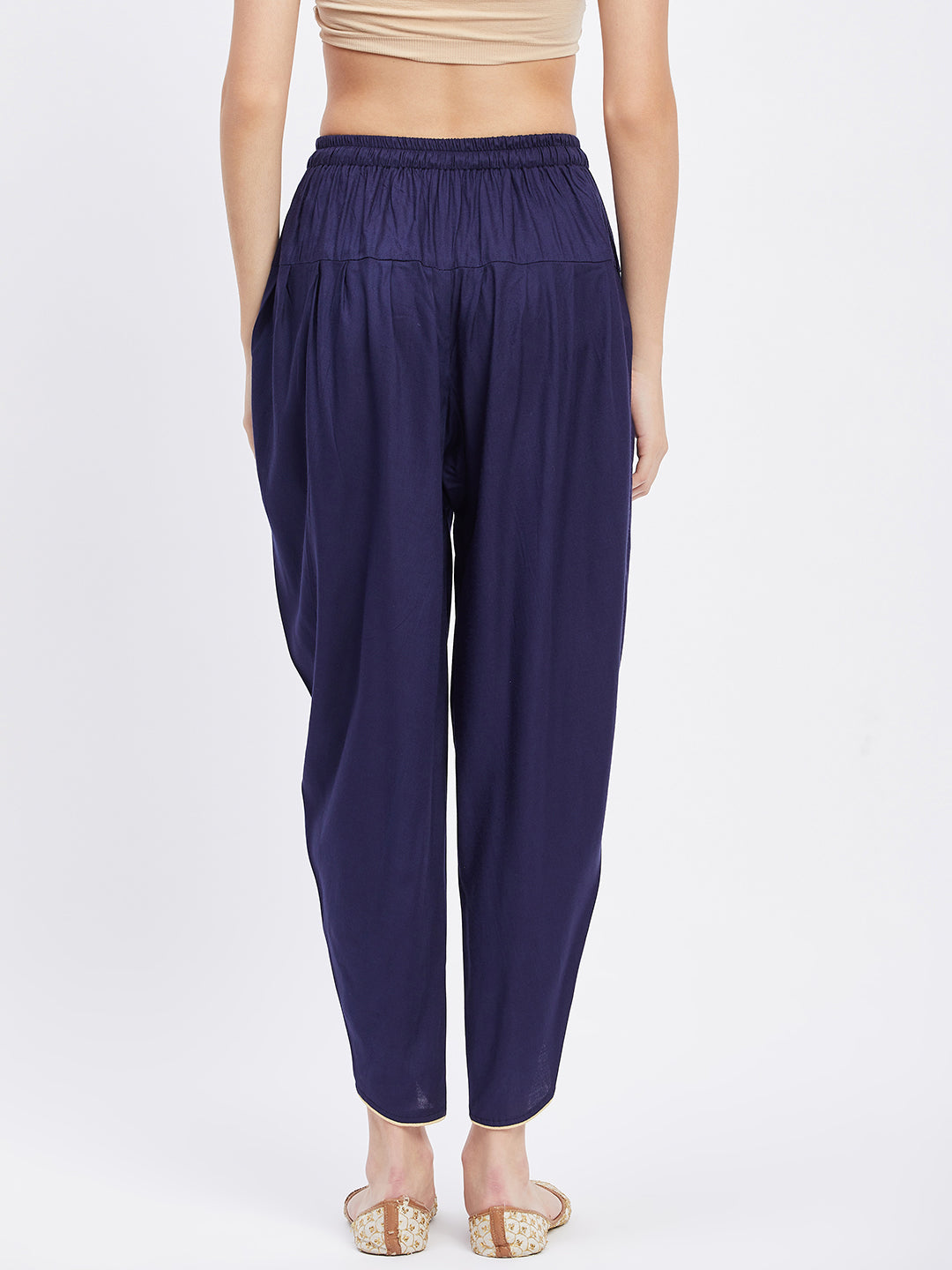 Navy Blue Solid Rayon Tulip Pant with elasticated waistband and drawstring.