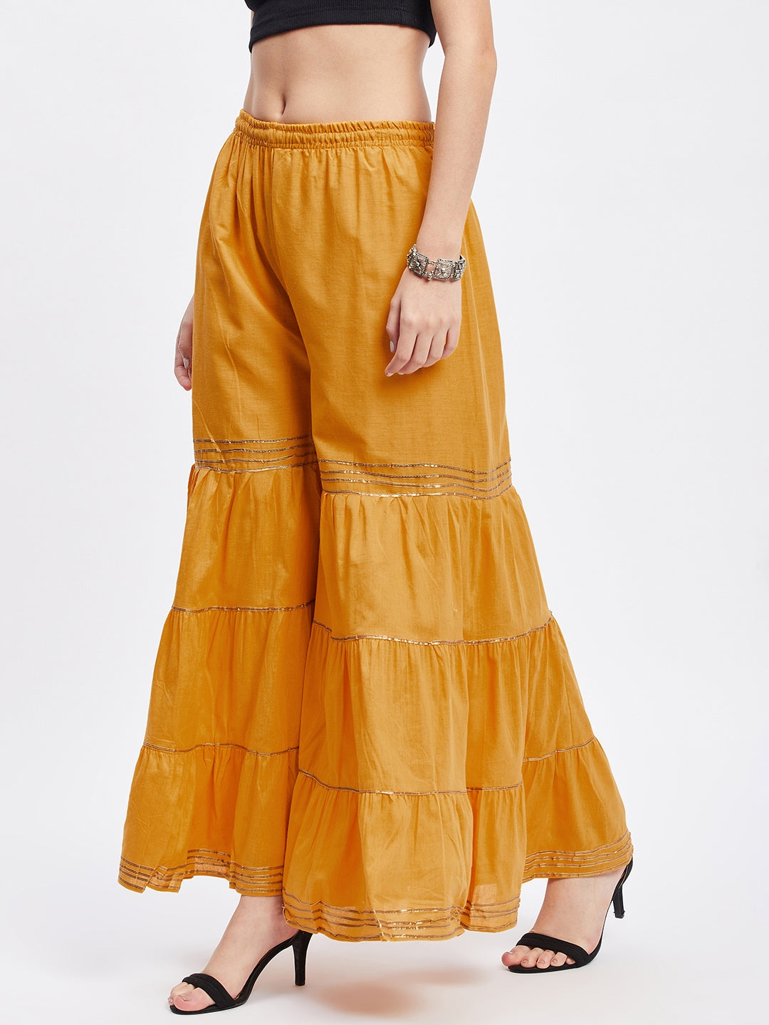 Mustard Gotta Patti Cotton Gharara with elasticated waistband and flared hem.