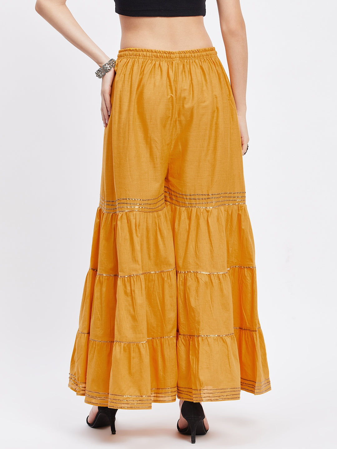 Mustard Gotta Patti cotton gharara with elastic waistband and flared hem.